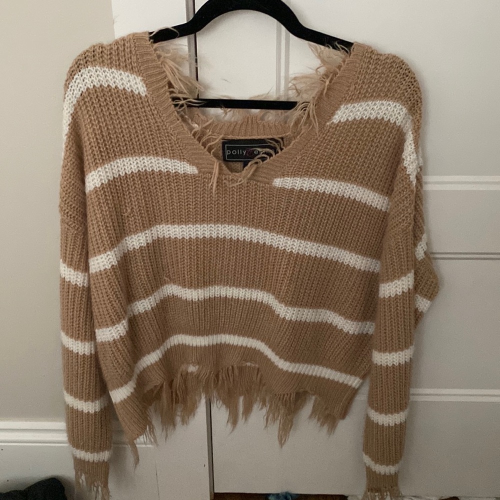 brown and white stripped distressed sweater